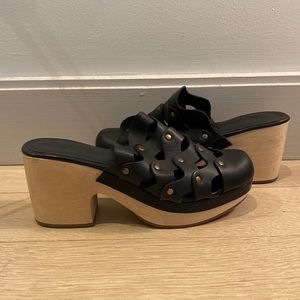 black leather clogs